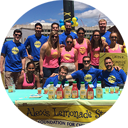 A group of coworkers at a lemonade stand