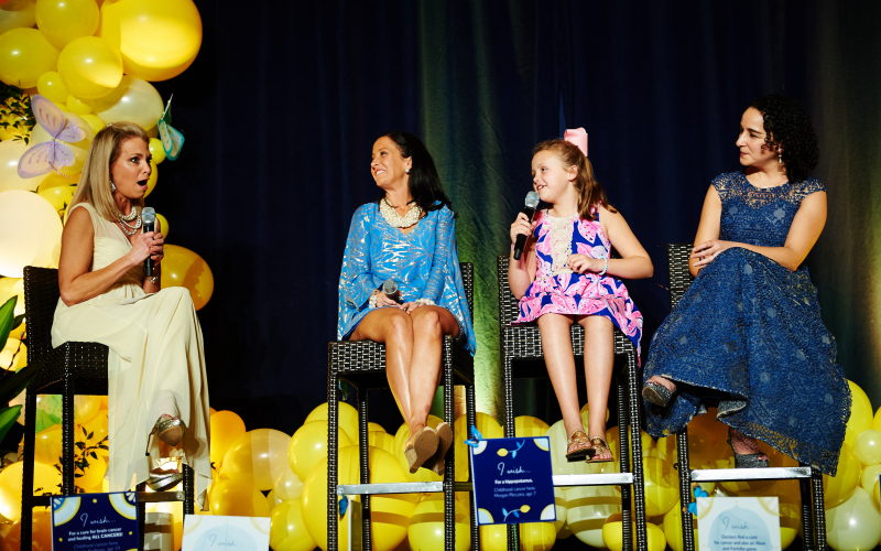 Above, Emily and Edie Gilger, together with their doctor, Yael Mosse, MD from the Children’s Hospital of Philadelphia share their remarkable survival story with guests at the 2019 Lemon Ball.