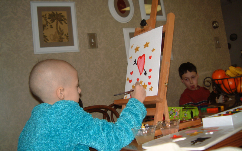 In 2004, Alex painted a picture of hearts and stars. Each year, supporters donate to ALSF for a chance to rent this painting. 