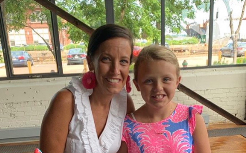 Edie, pictured above with mom Emily, celebrated her 10th birthday on June 7. 