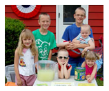 Group of children at lemonade stand